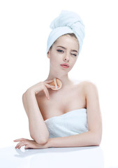 Beautiful sensual woman face, skin care concept / photo composition of blonde girl in towel - isolated on white background