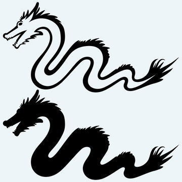 Traditional chinese dragon. Isolated on blue background. Vector silhouettes
