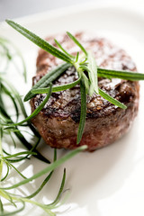 Grilled steak with rosemary
