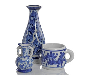 Jug and cup made of ceramic / Jug and cup made of ceramic on white background.