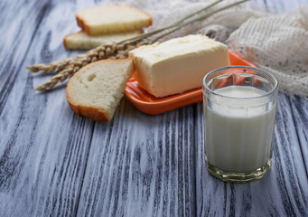 Glass of milk, bread and butter