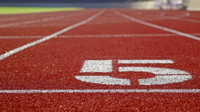 Running track with lane five on a stadium