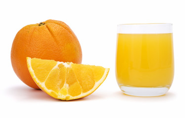 Piece of orange, ripe orange in background and glass with juice isolated on white. Clipping path incl.