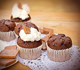 Delicious chocolate muffin with cream
