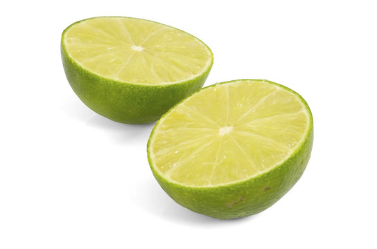 Two halves of lime / Two halves of lime on white background.
