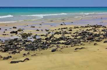 Fototapeta na wymiar View of the crystal clear water at Sotavento Beach, Fuerteventura, Canarian Islands, Spain