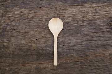 wooden spoon on wood table
