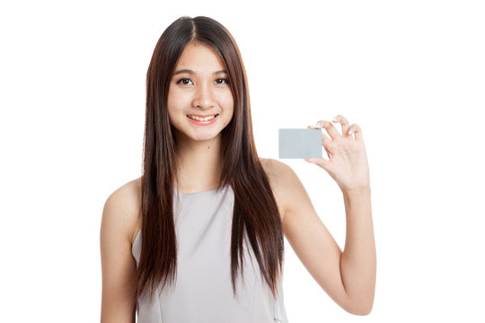 Beautiful young Asian woman hold a blank card