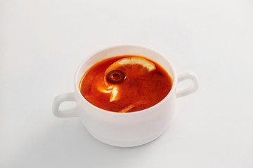traditional Russian soup solyanka isolated at white background