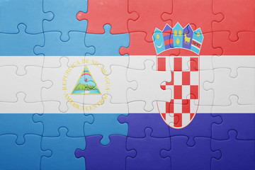 puzzle with the national flag of nicaragua and croatia