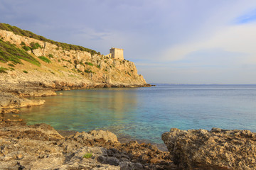 SALENTO. Bay Porto Selvaggio:in the background Dell'Alto watchtower.ITALY (Puglia)..The coast is rocky and jagged, and characterized by pine woods and Mediterranean bush.
