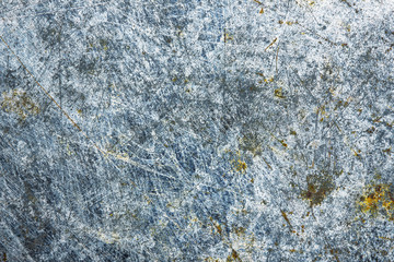 Corroded scratched metal surface background.