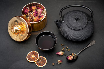 Green tea with rose flowers in the Asian style..