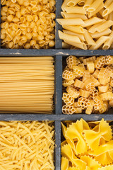 Different types of pasta in the wooden box