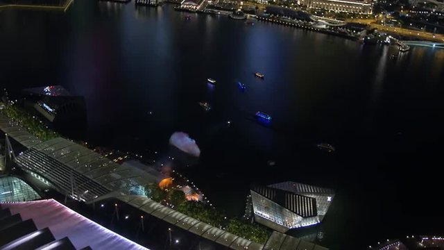 Nighttime view from above of the fountain in Marina Bay in Singapore. 
