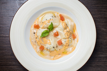 Tasty ravioli with parmesan