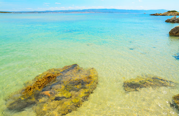 rocks and transparent water in Lazzaretto beach