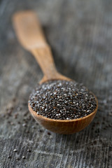 chia seeds in a wooden spoon