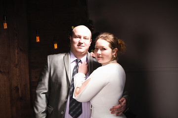 relaxed casual couple looking at the camera