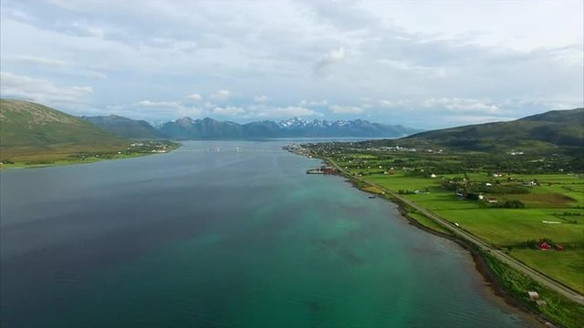 Scenic aerial footage of town Sortland with its long spanning bridge on Vesteralen islands in Norway. Aerial 4k Ultra HD.