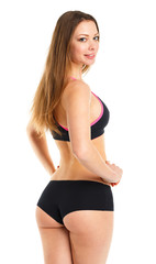 Obraz premium Beauty athletic girl on white, view from the back