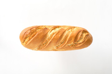bread in the form of a stick on a light background. view from above. space for inscriptions