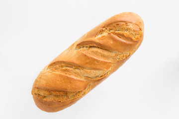 bread in the form of a stick on a light background. view from above. space for inscriptions
