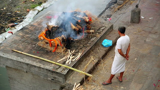 death corpse burning fire, cremation ceremony, pashupatinath temple, kathmandu, nepal