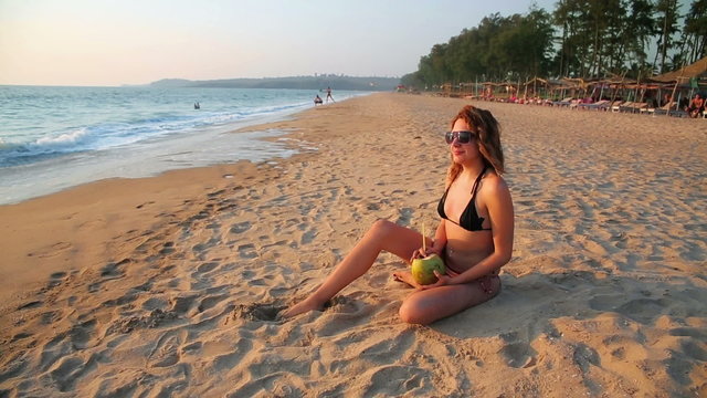Attractive young woman on beach
