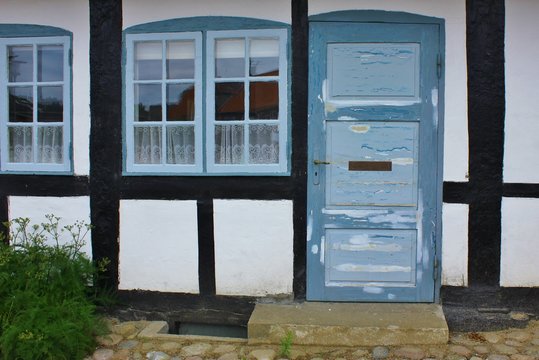 Entrance of a traditional, half-timbered house in Denmark