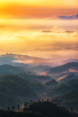 Sunrise view of mountain and mist in morning at Doi Hua Mae Kham, Chiangrai province,Thailand.