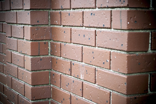 angled brown brick wall background