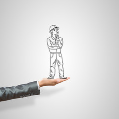 Caricatures of businessman in palm