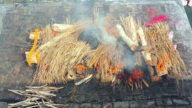 death corpse burning fire, cremation ceremony, pashupatinath temple, kathmandu, nepal