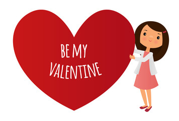 Girl holding a heart that says 