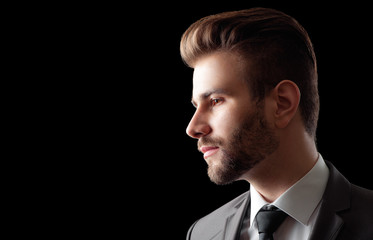 Close up portrait of Thoughtful young bearded man