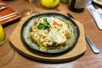 Baked salmon with potatoes and vegetables