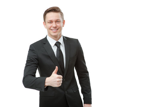 young man in formalwear showing his thumb up