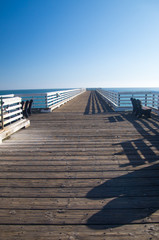 Long pier to the horizon in California