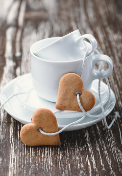 Valentine's Day concept. Heart-shaped biscuits and cups