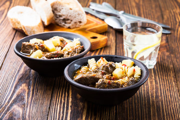 Beef stew with noodles and potatoes