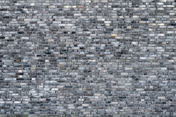 Repeating grey brick wall background