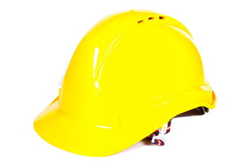 Fototapeta premium Closeup of yellow protective helmet on white background