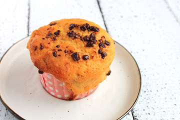 Chocolate Chip Muffin isolated on white