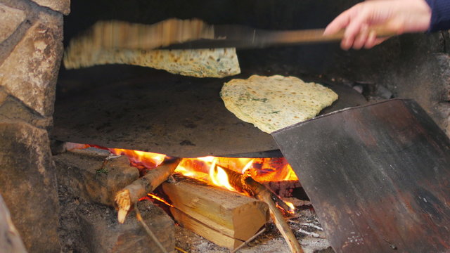 woman preparing traditional food, gozleme, safranbolu, turkey