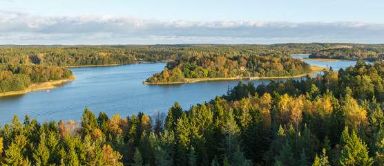 Autumn forest and lake, view from the top, Finland, Aland Islands