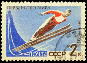 Wandaufkleber Flying skier on post stamp © Vic