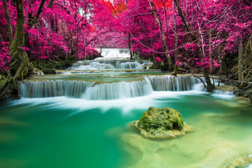 Fototapeta premium Beautiful waterfall in autumn forest 