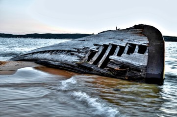 Stranded. Beached wooden shipwreck on the shores of Lake Superior in Pictured Rocks National...