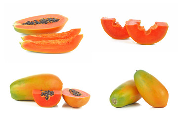 Set of  Half cut and whole papaya fruits on white background